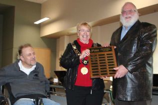 Warden Frances Smith and Frontenac Accessibility Advisory Committee Chair Neil Allen present Verona resident Doug Lovegrove with the 2015 County of Frontenac International Day of Persons with Disabilities Award.